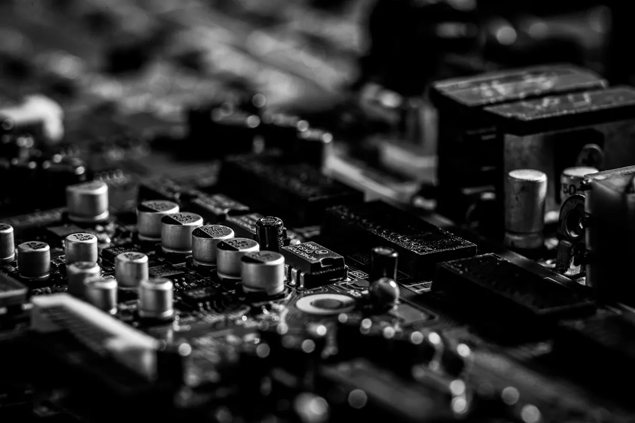 Close-up, black and white photo of a circuit board
